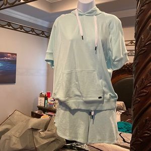 NWT. Hooded sweatshirt and matching shorts. Mint green with white lettering